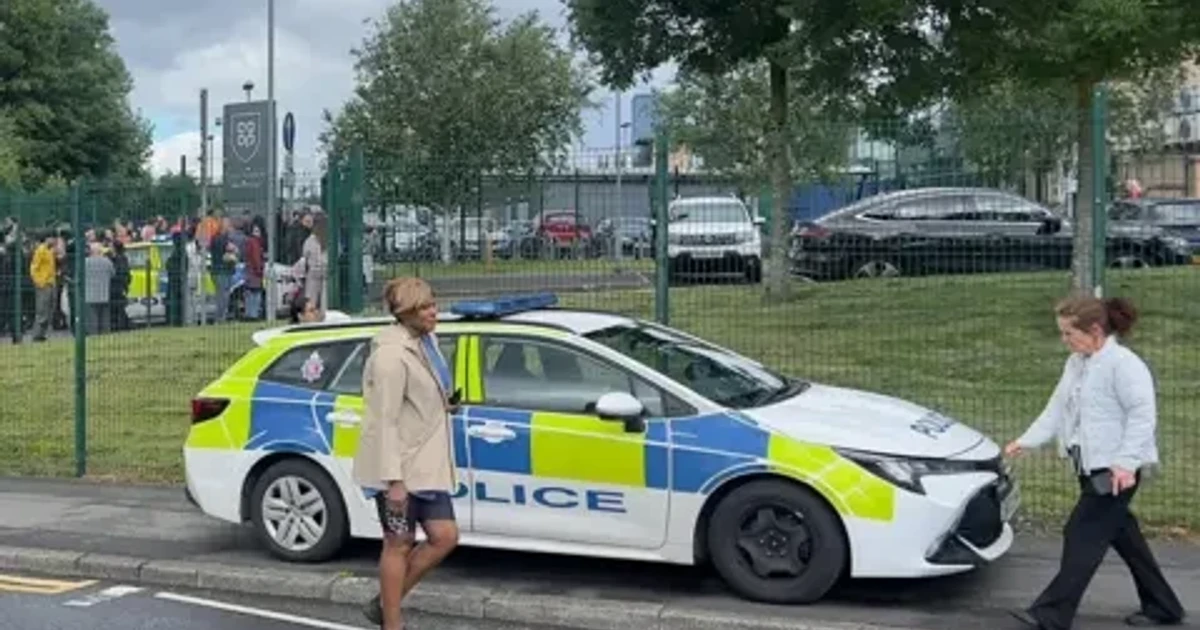 Pupil arrested after three injured in knife attack at Manchester school