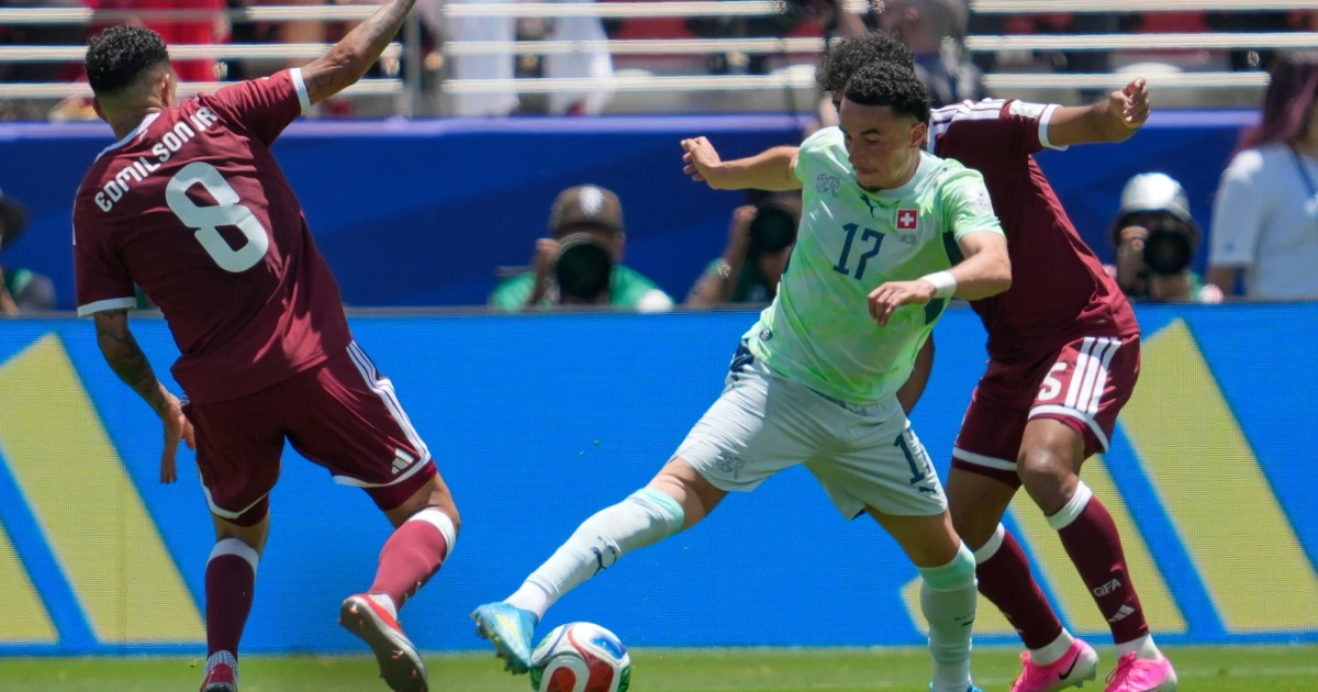 Qatar snatches late draw against Switzerland in World Cup debut