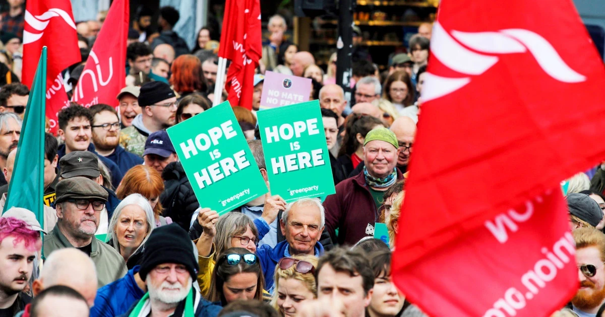 Thousands rally in Belfast after anti-immigrant riots and arson attacks