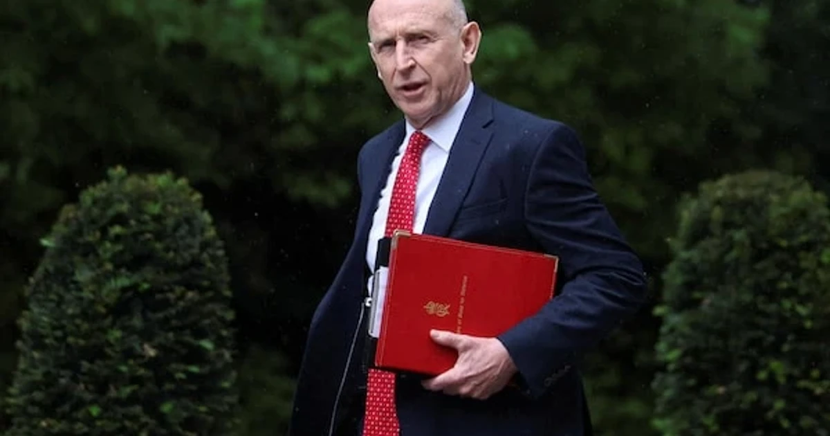 Britain weighs defense spending as minister quits over budget dispute