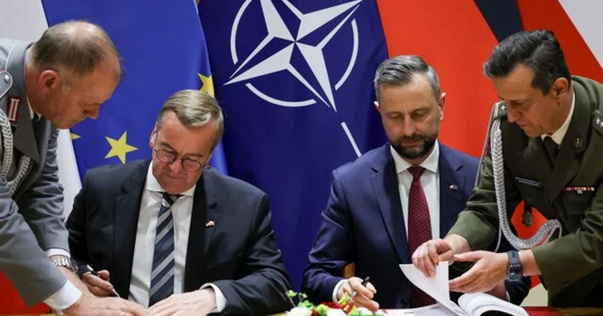 Poland and Germany sign defense pact amid Russia concerns