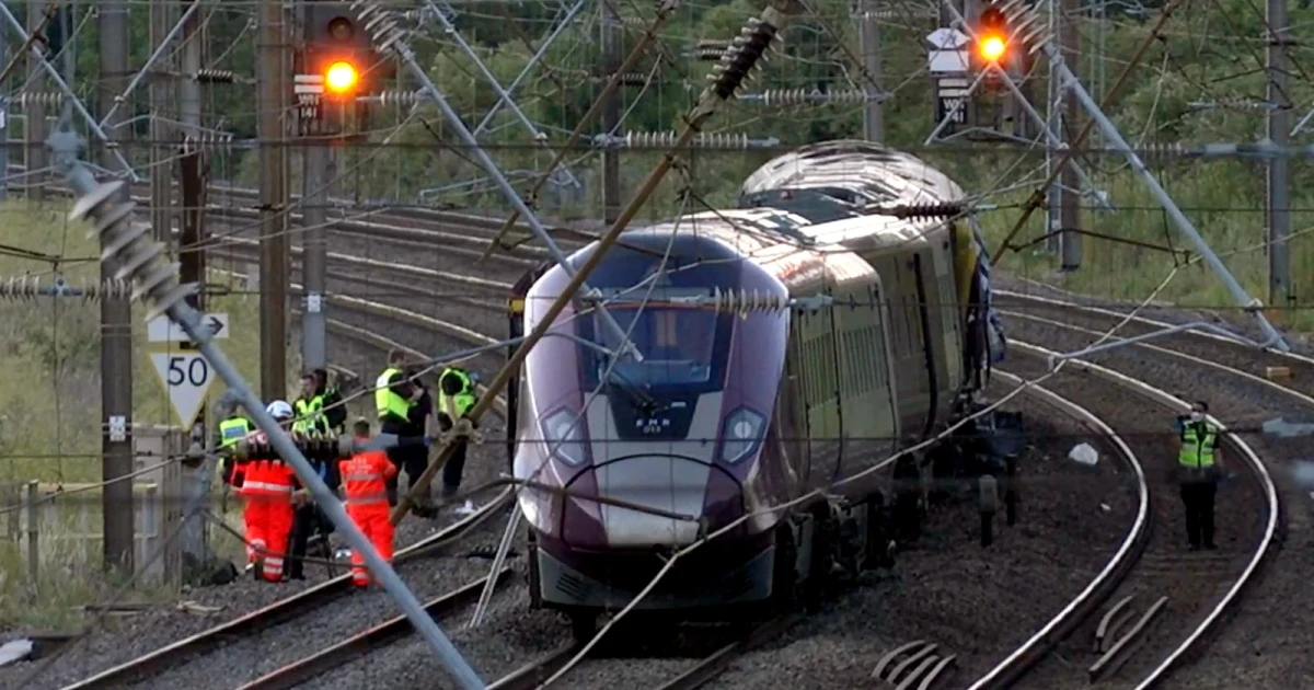 Train collision near Bedford kills driver, injures dozens