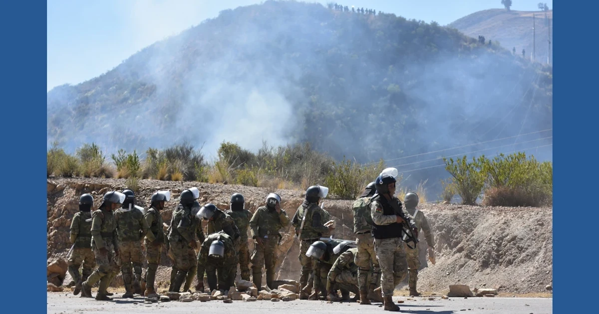 Bolivia eases road blockades as military plane crash kills six