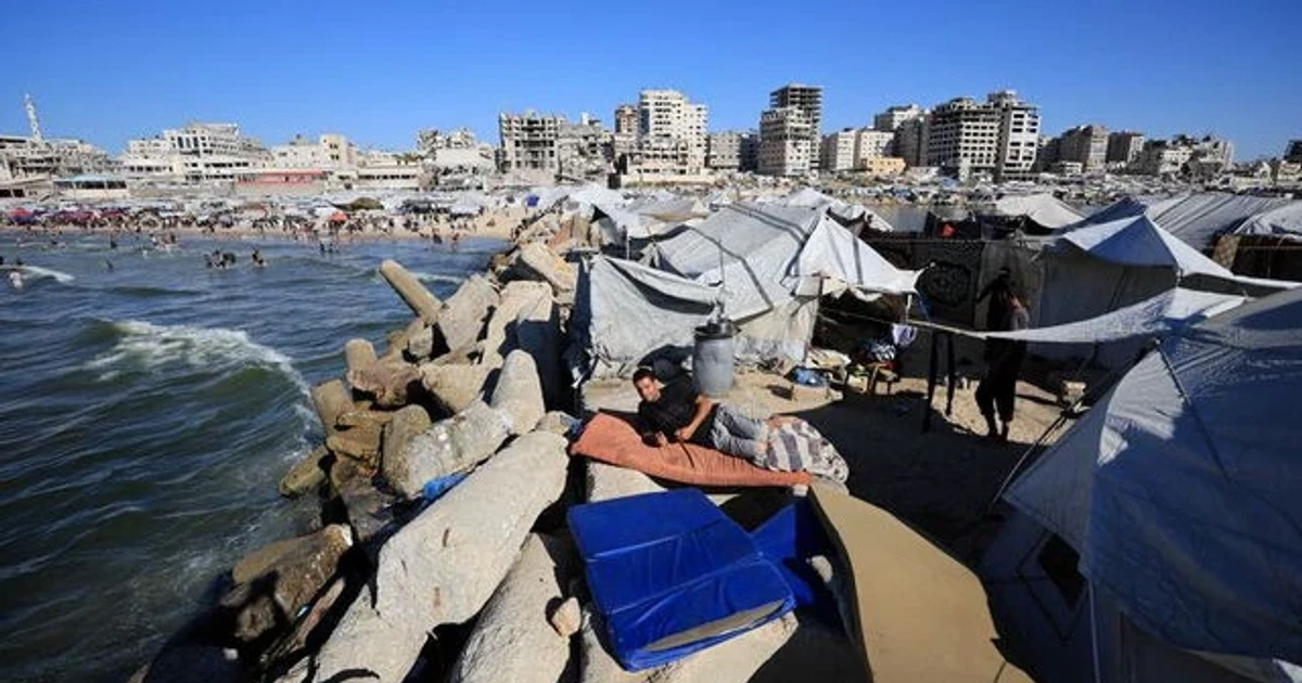 As Gaza heats up, displaced families seek relief at the sea