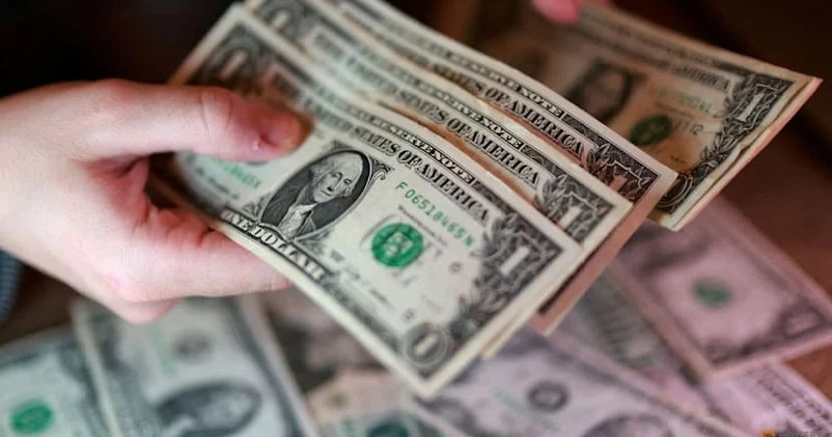 Dollar hits 13-month high as Fed hike bets surge
