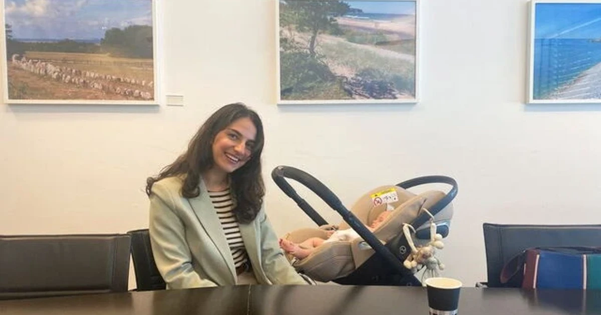 Sweden's climate minister brings baby to EU talks on parental leave