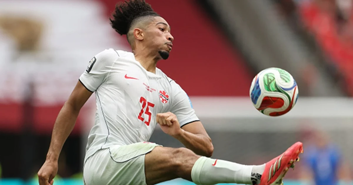 Canada reaches World Cup last 16 with first knockout win