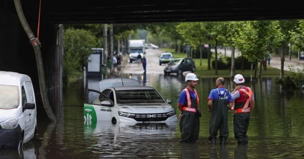 Storm kills one in Romania after heat wave, floods Bucharest