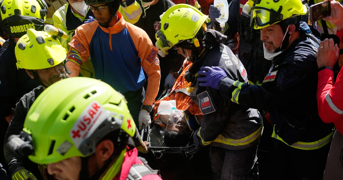 Venezuela rescue pulls security guard alive from collapsed basement