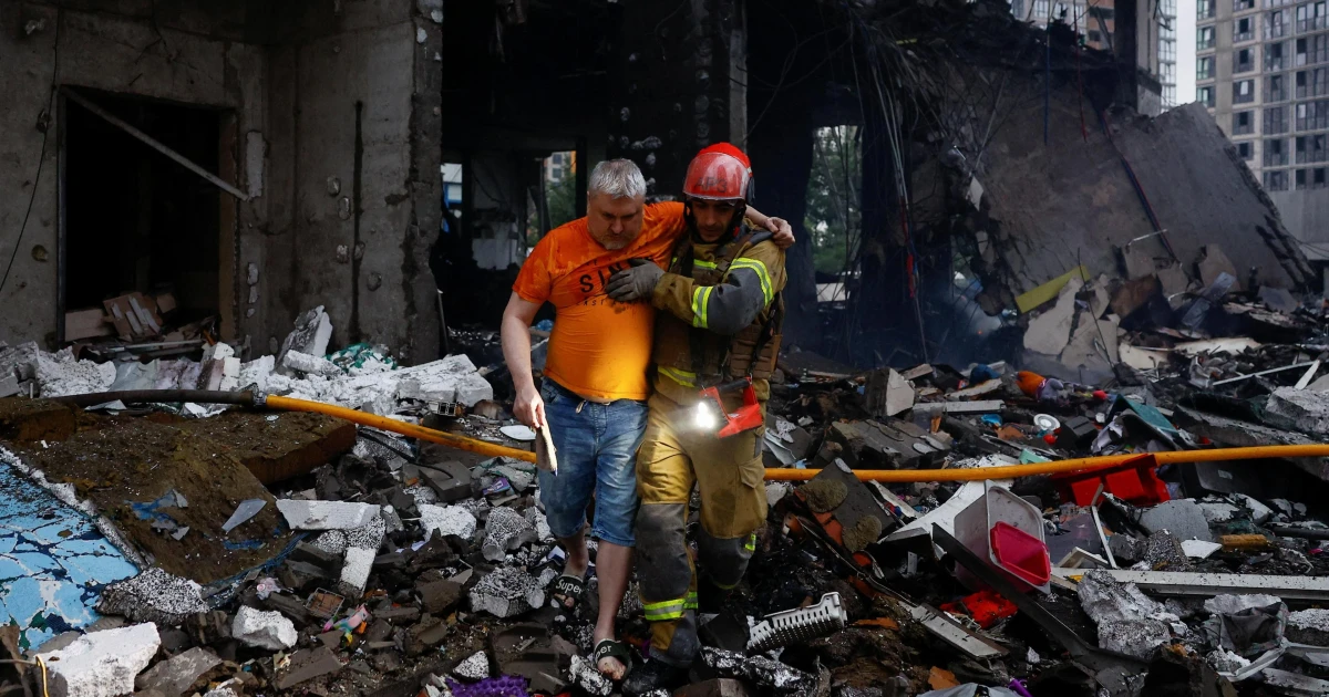 Russia strikes Kyiv again as rescuers search rubble before Nato summit