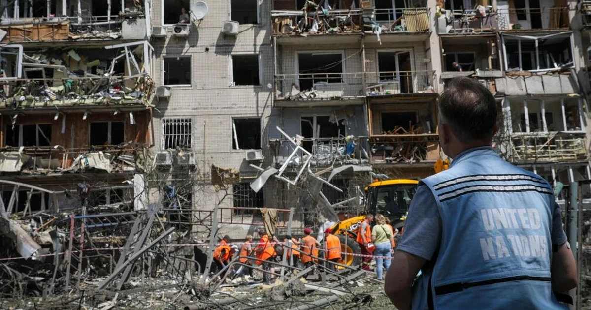 Russian strikes kill 14 in Kyiv, Ukrainian air defences run short