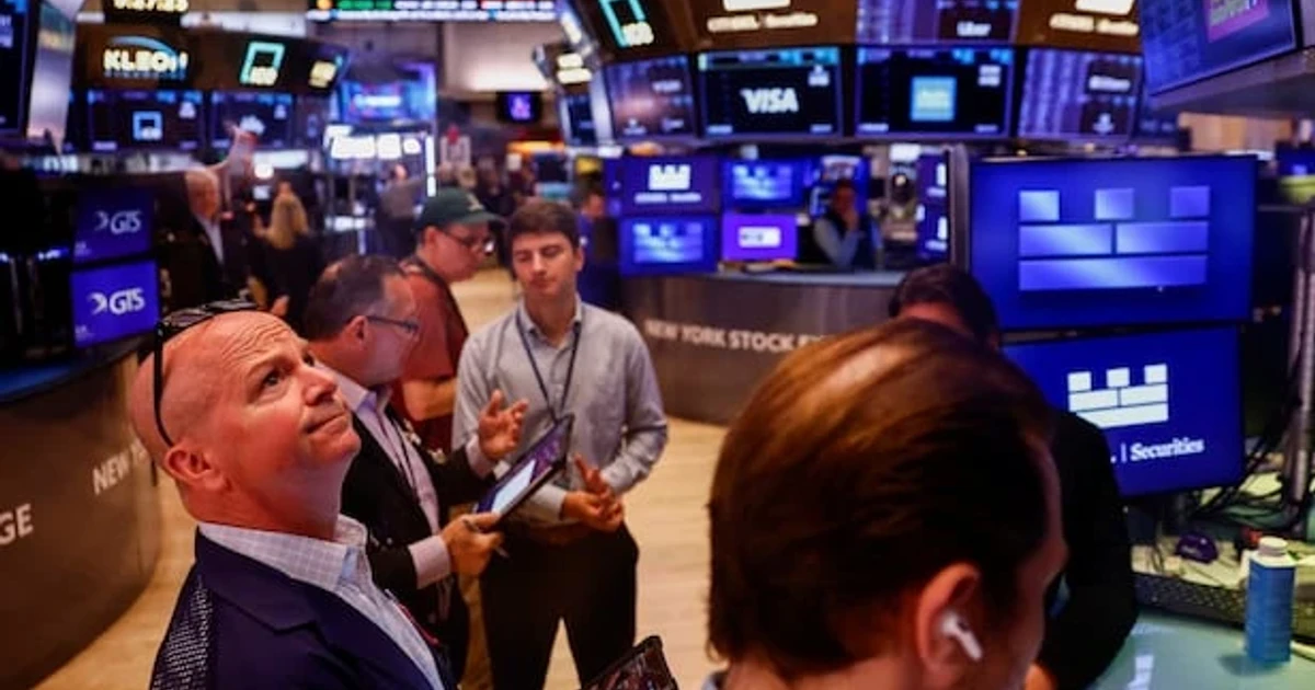 Dow tops 53,000 for first time as AI stocks rally