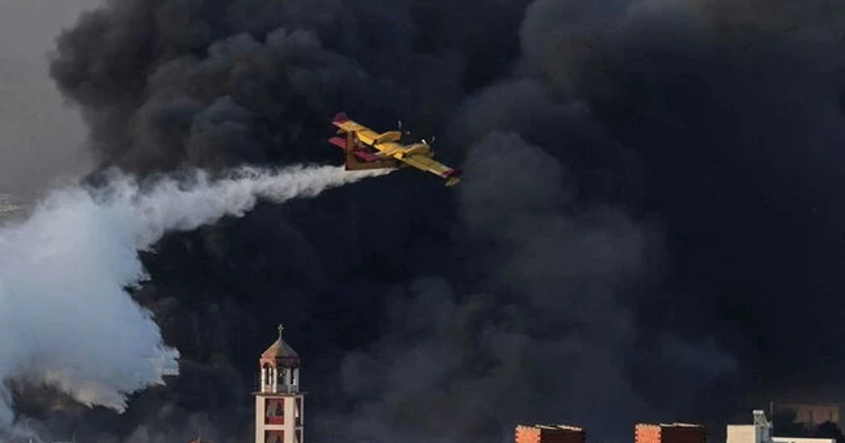 Major fire near Athens injures at least two, prompts evacuations