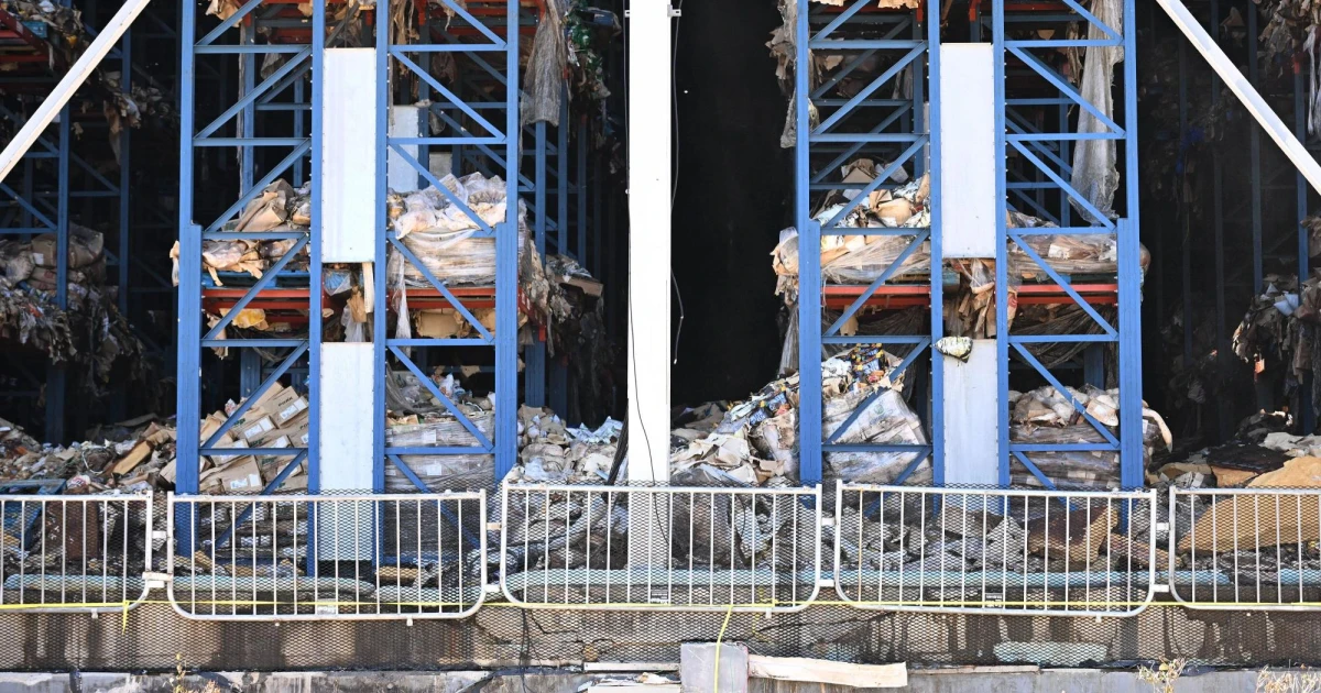 Los Angeles residents endure stench as burned warehouse cleanup begins