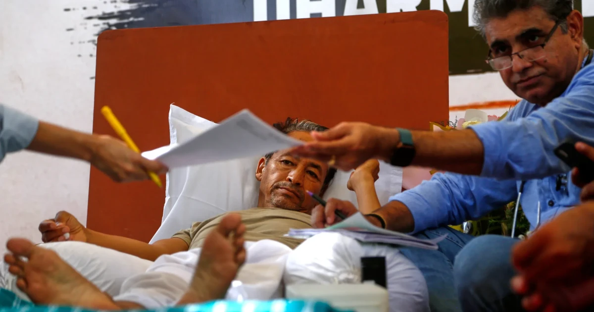 India exam leak protest swells after activist's forced hospitalisation