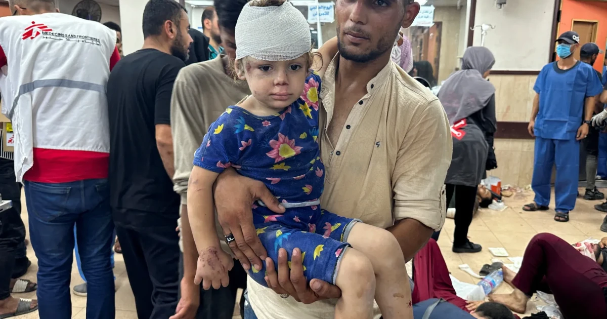 Palestinians mourn loved ones after Israeli strike in central Gaza