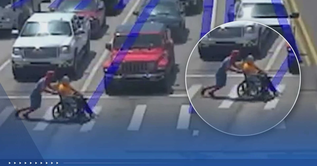 Spider-Man helps man in wheelchair cross busy Arkansas intersection