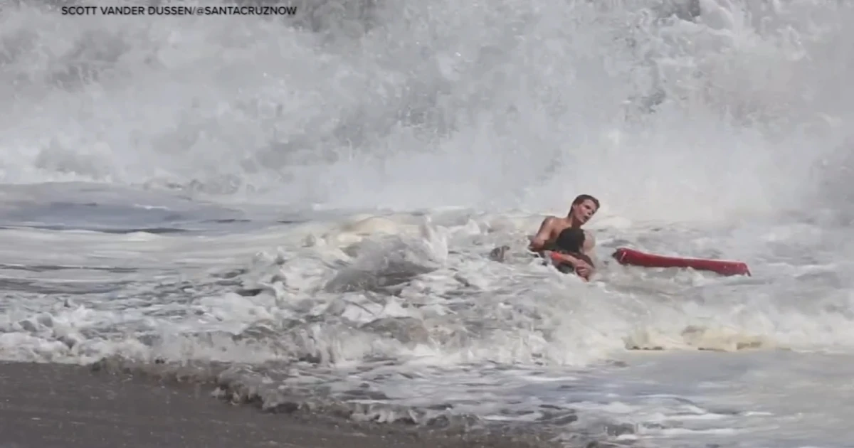 Lifeguard overpowered by waves during Santa Cruz beach rescue