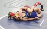 Making up for lost time: Petersen misses bouts before winning Cougar title